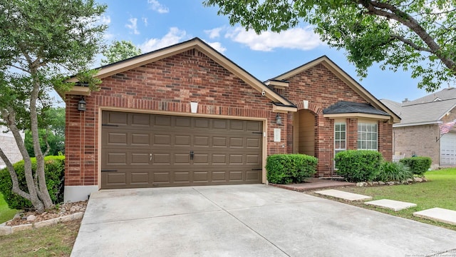 21627 Rio Comal, San Antonio, TX 78259 - view of front facade featuring brick siding, a garage, and concrete driveway
