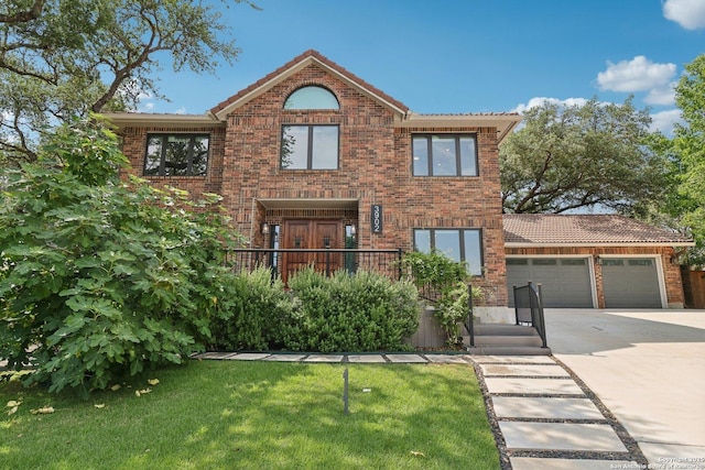 3902 Creek Pt, San Antonio, TX 78230 - traditional home with driveway, a garage, a front yard, and brick siding