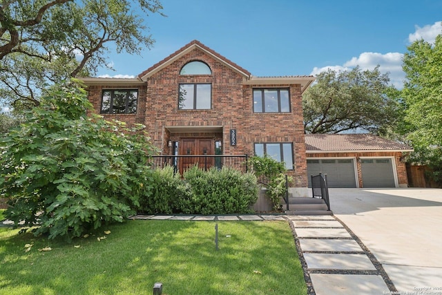 3902 Creek Pt, San Antonio, TX 78230 - traditional-style house with concrete driveway, a garage, brick siding, and a front yard