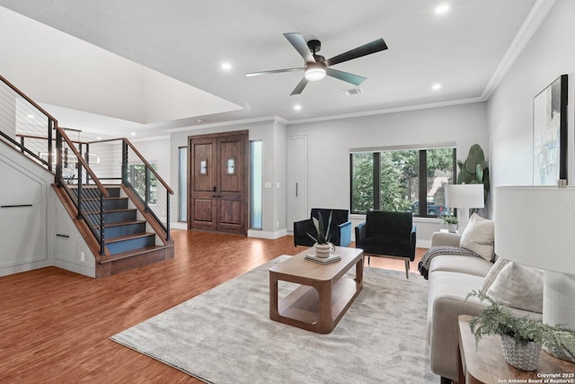3902 Creek Pt, San Antonio, TX 78230 - living area with wood finished floors, stairs, crown molding, recessed lighting, and ceiling fan
