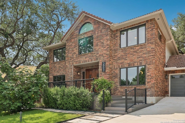 3902 Creek Pt, San Antonio, TX 78230 - view of building exterior with concrete driveway and an attached garage