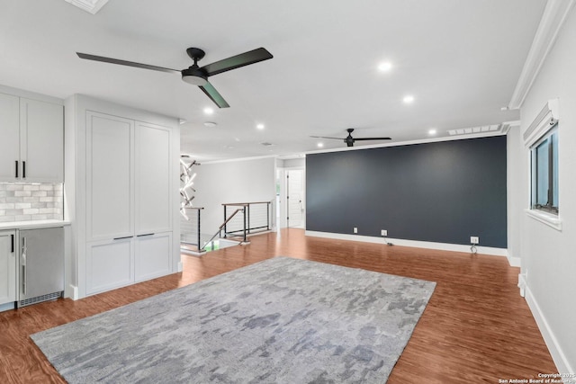 3902 Creek Pt, San Antonio, TX 78230 - living area featuring ceiling fan, ornamental molding, recessed lighting, wood finished floors, and baseboards