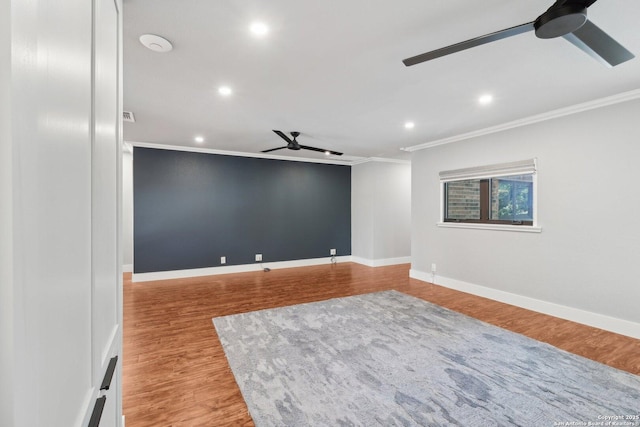 3902 Creek Pt, San Antonio, TX 78230 - spare room featuring a ceiling fan, crown molding, recessed lighting, baseboards, and wood finished floors