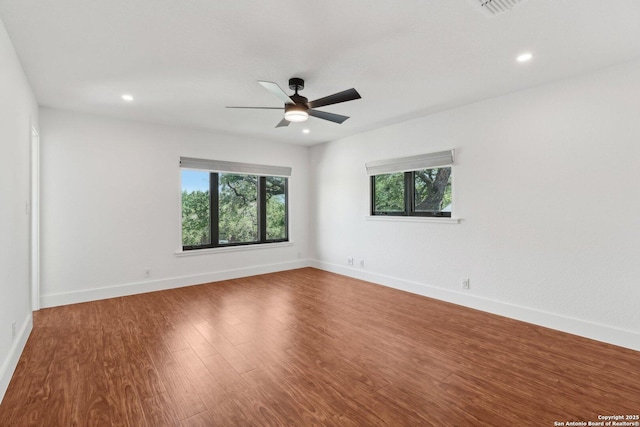 3902 Creek Pt, San Antonio, TX 78230 - unfurnished room with wood finished floors, recessed lighting, ceiling fan, and baseboards
