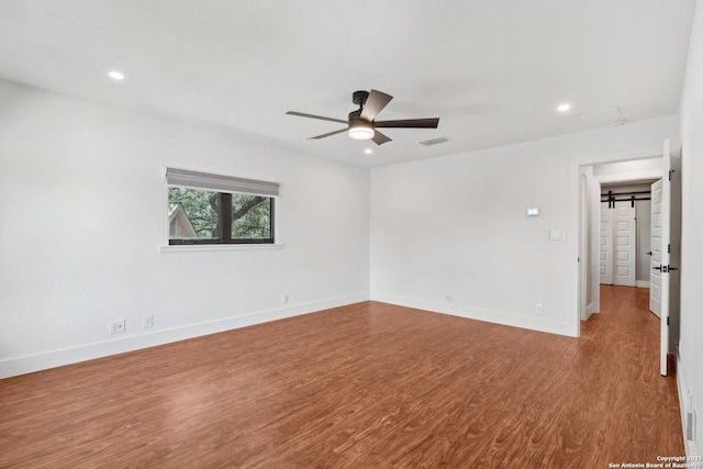 3902 Creek Pt, San Antonio, TX 78230 - empty room with wood finished floors, recessed lighting, ceiling fan, and baseboards