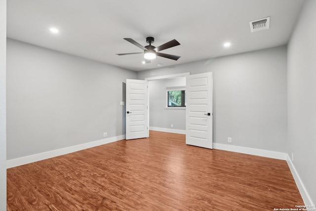3902 Creek Pt, San Antonio, TX 78230 - unfurnished room featuring a ceiling fan, wood finished floors, baseboards, and recessed lighting