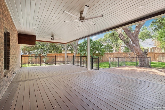 3902 Creek Pt, San Antonio, TX 78230 - wooden terrace with a ceiling fan and a fenced backyard