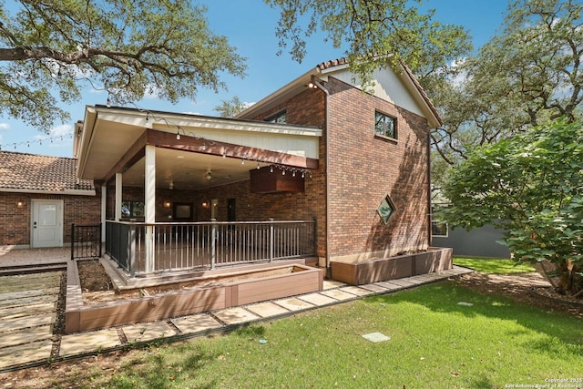 3902 Creek Pt, San Antonio, TX 78230 - back of house featuring brick siding and a lawn