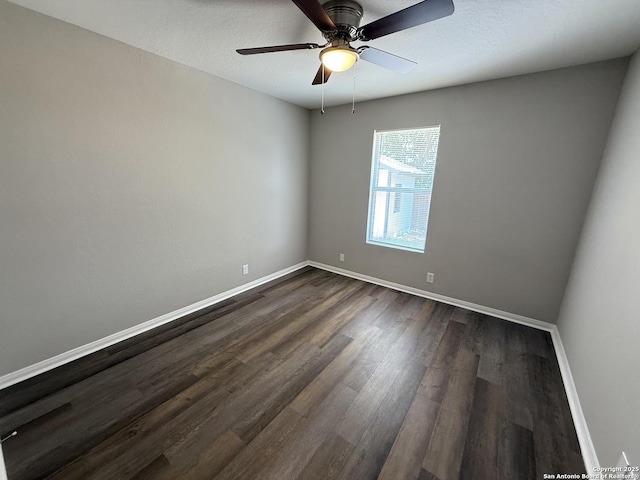 4742 Highland Farm, San Antonio, TX 78244 - empty room featuring dark wood-type flooring, baseboards, and a ceiling fan