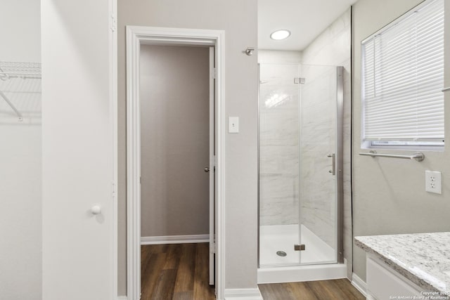 4742 Highland Farm, San Antonio, TX 78244 - full bathroom featuring a shower stall, wood finished floors, and a spacious closet