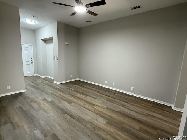 4742 Highland Farm, San Antonio, TX 78244 - spare room featuring ceiling fan, dark wood-style flooring, and baseboards
