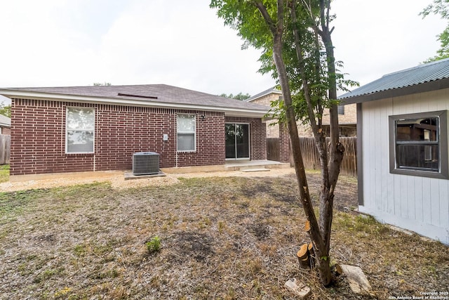 4742 Highland Farm, San Antonio, TX 78244 - rear view of property featuring cooling unit and brick siding