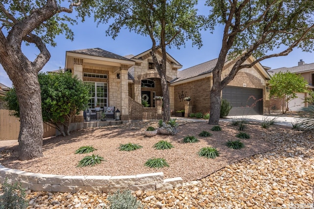 13055 Grove Pt, San Antonio, TX 78253 - view of front of property with brick siding, an attached garage, concrete driveway, and stone siding