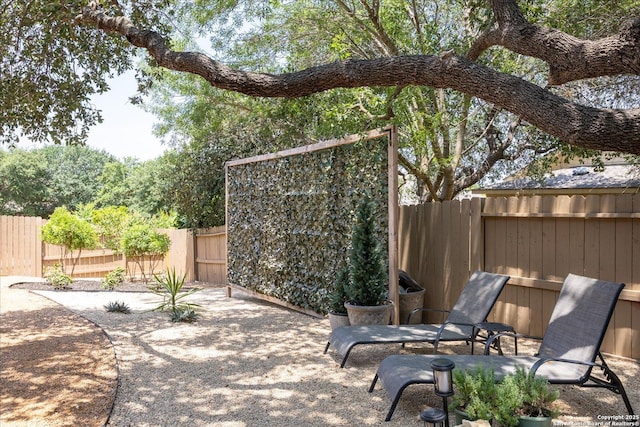 13055 Grove Pt, San Antonio, TX 78253 - fenced backyard featuring a patio area