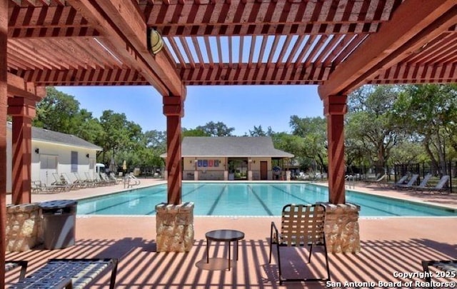 17206 Ashbury, San Antonio, TX 78247 - community pool featuring a pergola, a patio, and view of wooded area