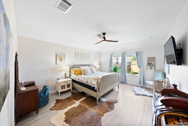 5483 Jasmine, Bulverde, TX 78163 - bedroom featuring wood finished floors, baseboards, and a ceiling fan