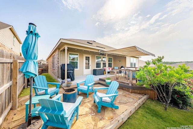 5483 Jasmine, Bulverde, TX 78163 - back of property featuring a fenced backyard and a patio area