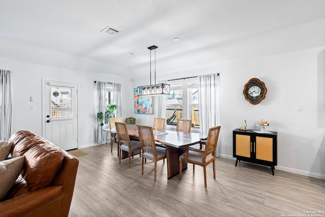 5483 Jasmine, Bulverde, TX 78163 - dining area featuring healthy amount of natural light, baseboards, and light wood-style flooring