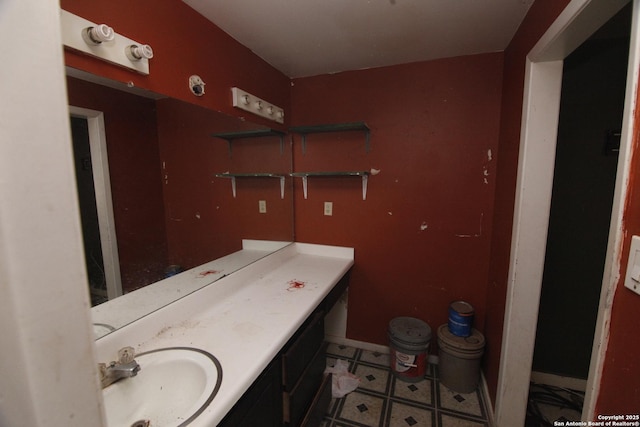 1413 Martin, Pleasanton, TX 78064 - bathroom with vanity and baseboards
