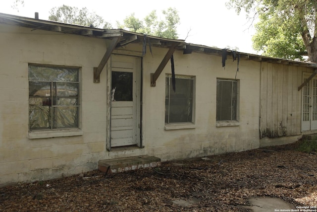 1413 Martin, Pleasanton, TX 78064 - view of property exterior featuring concrete block siding