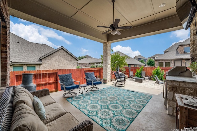 2023 Wilby Ln, San Antonio, TX 78253 - fenced backyard with a patio, an outdoor hangout area, ceiling fan, a residential view, and a grill