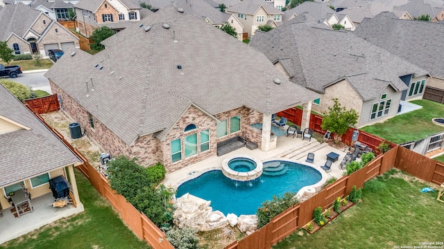 2023 Wilby Ln, San Antonio, TX 78253 - view of pool with a residential view, a patio, a pool with connected hot tub, and a grill