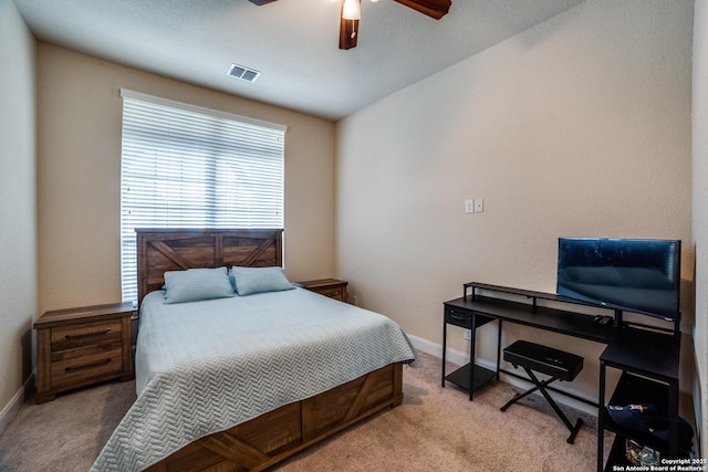 2023 Wilby Ln, San Antonio, TX 78253 - bedroom with light carpet, baseboards, and a ceiling fan