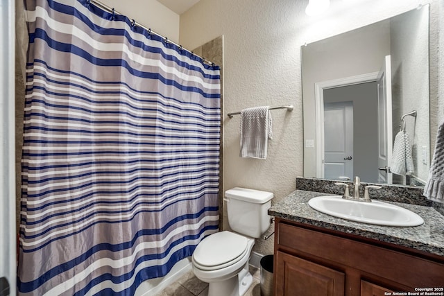 2023 Wilby Ln, San Antonio, TX 78253 - full bath with a textured wall, toilet, vanity, a shower with curtain, and tile patterned floors