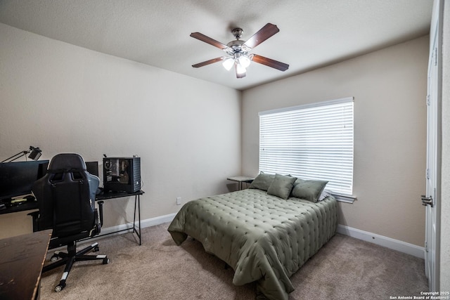 2023 Wilby Ln, San Antonio, TX 78253 - bedroom with carpet flooring, an office area, baseboards, and a ceiling fan
