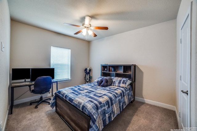 2023 Wilby Ln, San Antonio, TX 78253 - carpeted bedroom with baseboards, a ceiling fan, and an office area