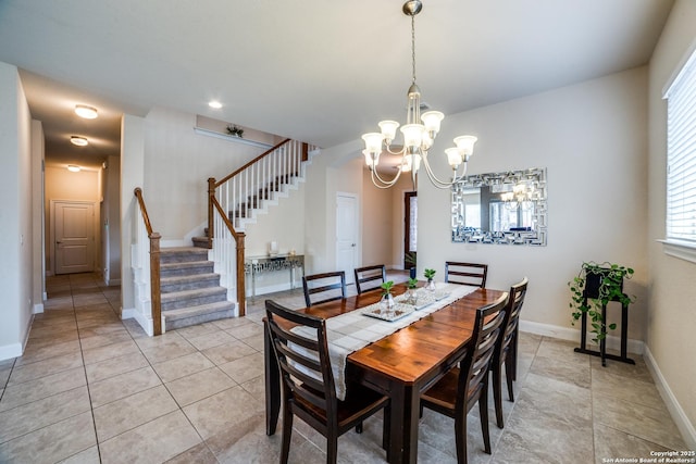 2023 Wilby Ln, San Antonio, TX 78253 - dining space featuring stairway, a chandelier, baseboards, and light tile patterned floors