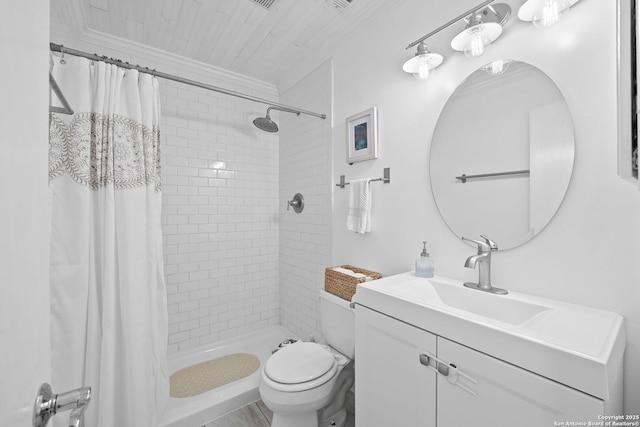 4303 Lakebend W, San Antonio, TX 78244 - bathroom with vanity, a tile shower, toilet, and ornamental molding