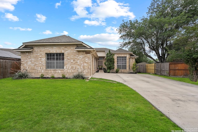 4303 Lakebend W, San Antonio, TX 78244 - view of front of home with brick siding, a shingled roof, and driveway