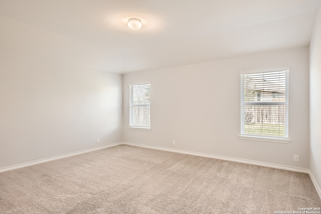 4823 Swing Arc, San Antonio, TX 78261 - empty room featuring light carpet and baseboards