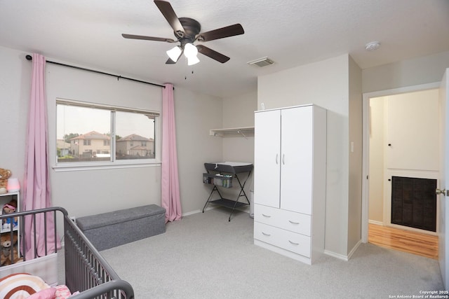 9011 Twincreek Farm, Converse, TX 78109 - bedroom featuring light colored carpet, baseboards, ceiling fan, and a closet