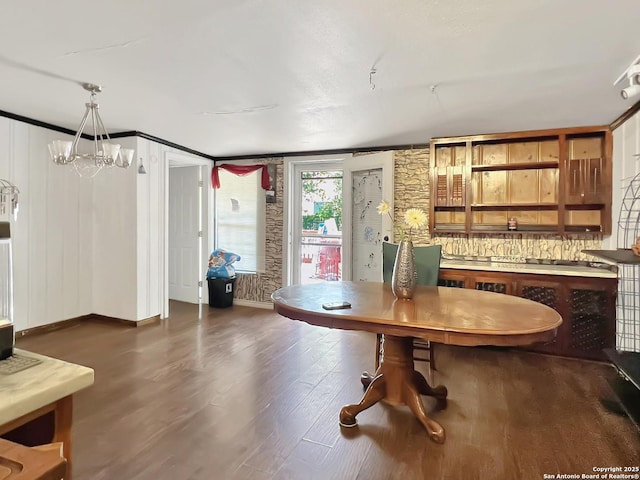 410 W Dickson, San Antonio, TX 78214 - dining area with a chandelier and dark wood-type flooring