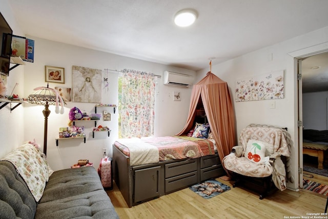 820 Kunkel, Seguin, TX 78155 - bedroom with an AC wall unit and wood finished floors