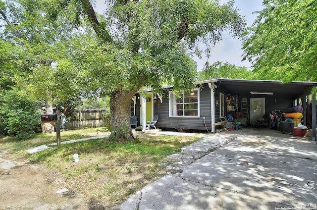 820 Kunkel, Seguin, TX 78155 - view of front of home featuring driveway and a carport