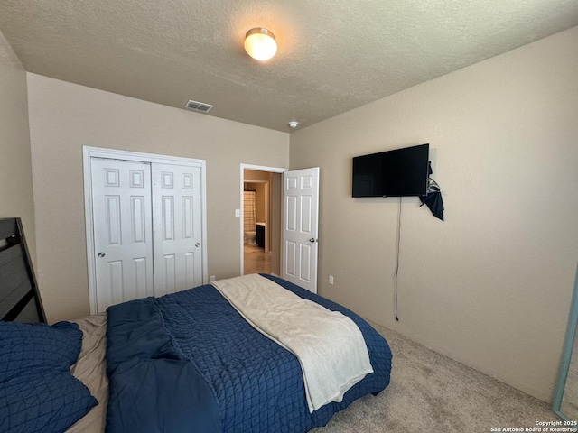 5726 Ivans Farm, San Antonio, TX 78244 - carpeted bedroom featuring a textured ceiling and a closet