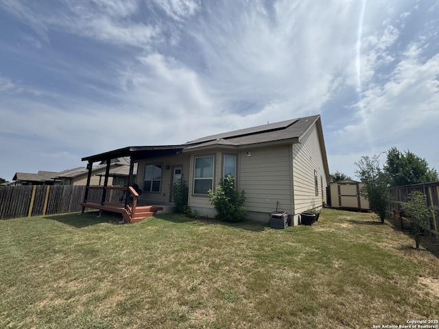 5726 Ivans Farm, San Antonio, TX 78244 - rear view of house featuring a wooden deck and solar panels
