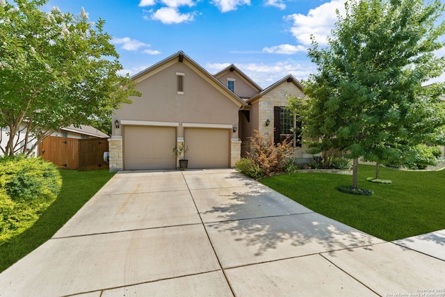 9730 Kremmen, Boerne, TX 78006 - traditional-style home with stone siding, concrete driveway, a garage, and stucco siding