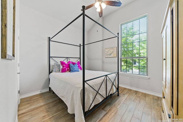 9730 Kremmen, Boerne, TX 78006 - bedroom with baseboards, wood finished floors, and a ceiling fan
