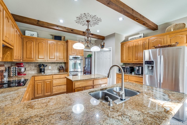 31763 Scarteen, Fair Oaks Ranch, TX 78015 - kitchen featuring stainless steel fridge, black electric stovetop, a sink, beam ceiling, and a kitchen island