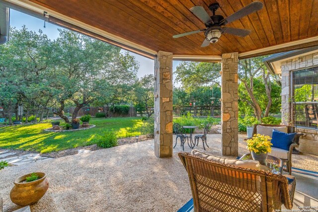 31763 Scarteen, Fair Oaks Ranch, TX 78015 - view of patio / terrace with ceiling fan and view of wooded area