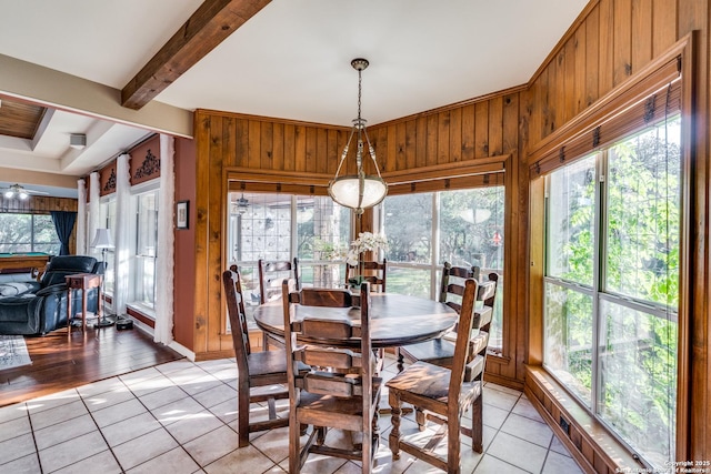 31763 Scarteen, Fair Oaks Ranch, TX 78015 - dining room with light tile patterned floors, wood walls, and beamed ceiling