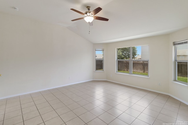 9726 Copper Rock, Converse, TX 78109 - unfurnished room with healthy amount of natural light, vaulted ceiling, a ceiling fan, baseboards, and light tile patterned floors