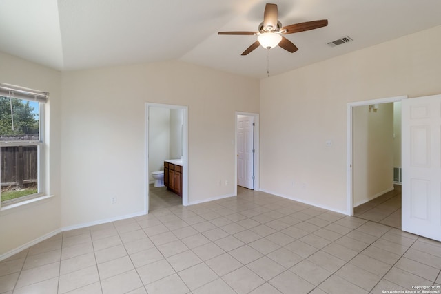 9726 Copper Rock, Converse, TX 78109 - unfurnished room with a ceiling fan, vaulted ceiling, light tile patterned floors, and baseboards