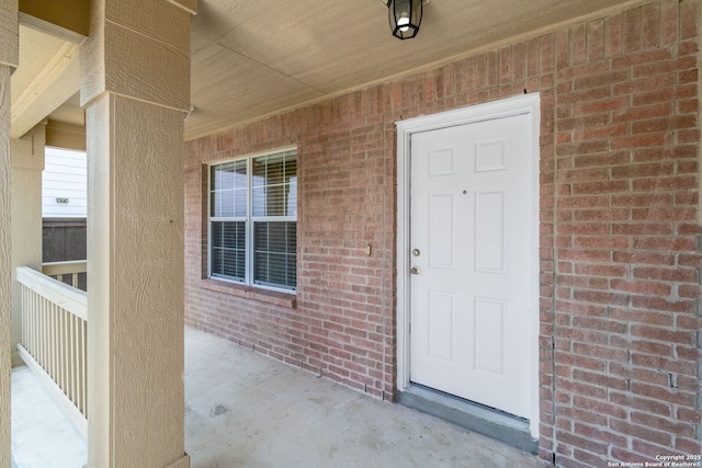 9726 Copper Rock, Converse, TX 78109 - view of exterior entry featuring brick siding