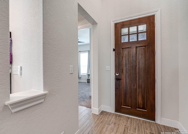 22806 Rio Salado, San Antonio, TX 78261 - foyer entrance with a textured wall and wood tiled floors