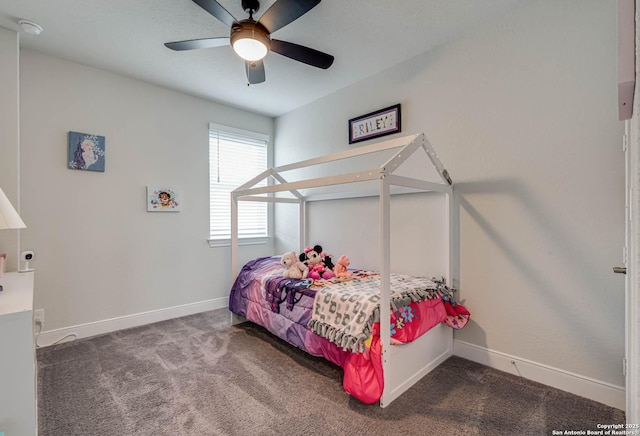 22806 Rio Salado, San Antonio, TX 78261 - carpeted bedroom with baseboards and ceiling fan